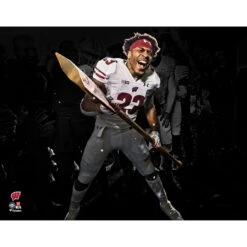 Jonathan Taylor Wisconsin Badgers Fanatics Authentic Unsigned Paul Bunyan Football Trophy Celebration Photograph